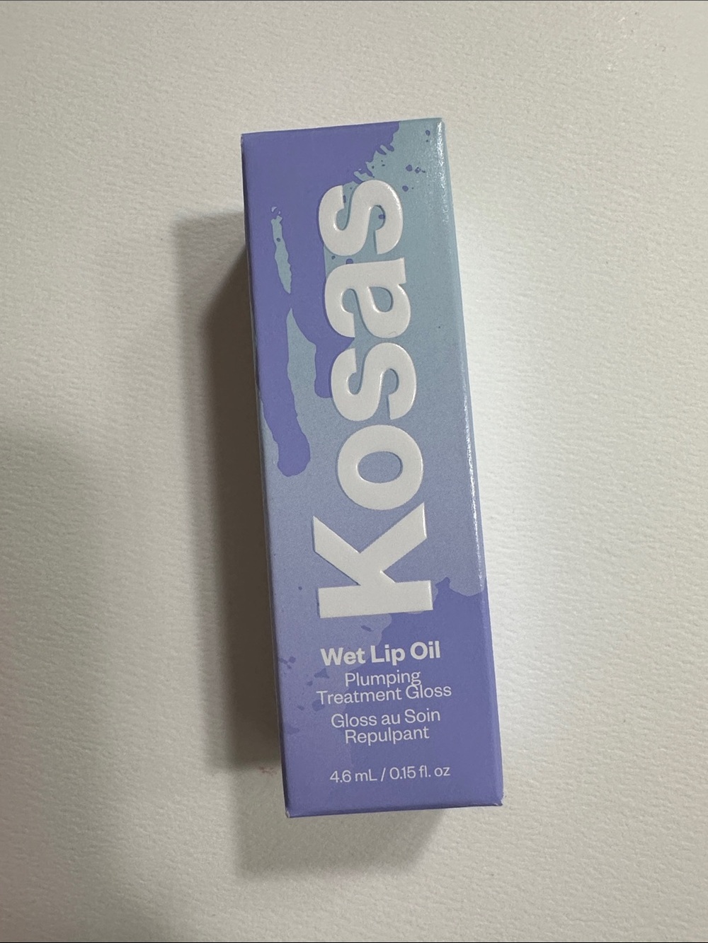 NIB Kosas Wet Lip Oil Plumping Treatment Gloss — Grapesicle